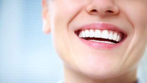 Happy National Smile Power Day! The Benefits of Smiling More with Heroes Dental