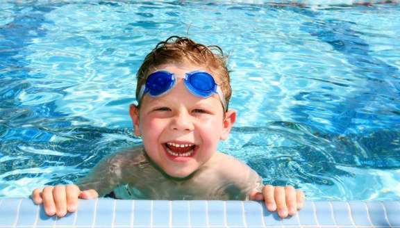 Your Teeth, Pool Time, & Tips to Keep Those Pearly Whites Shining